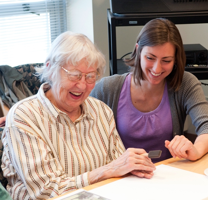 Student laughing with a client