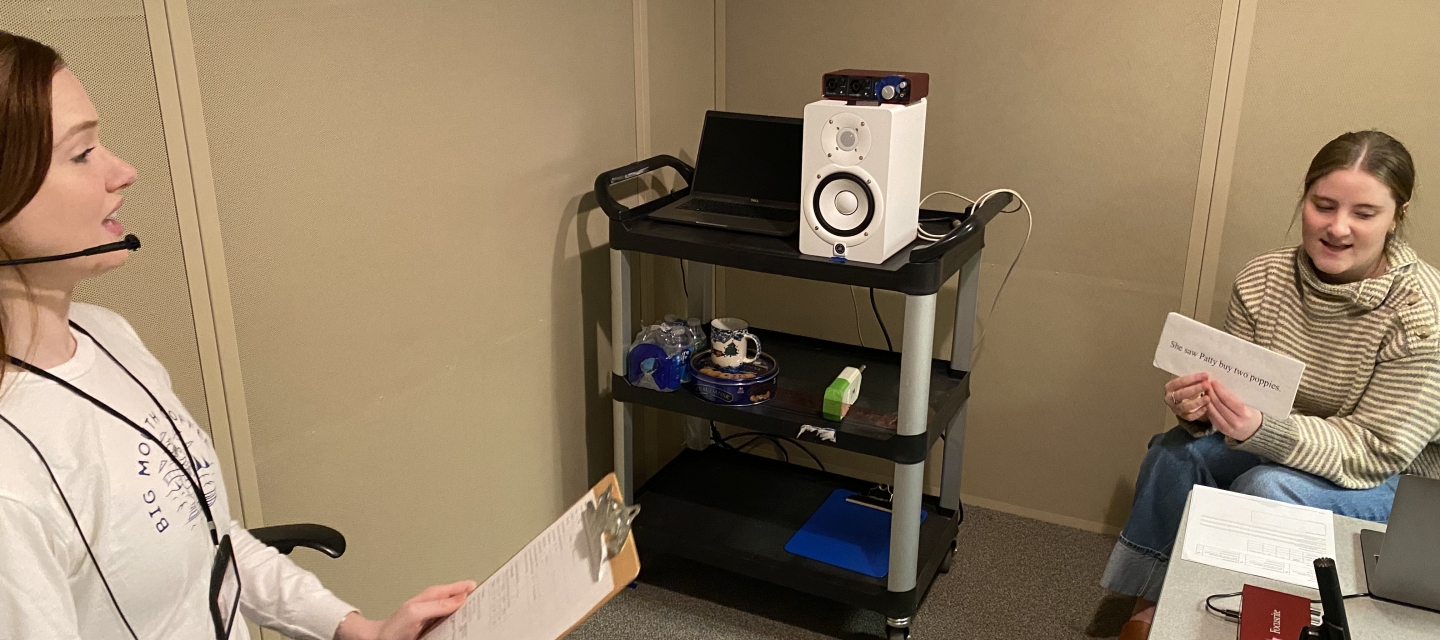 students using audio booth